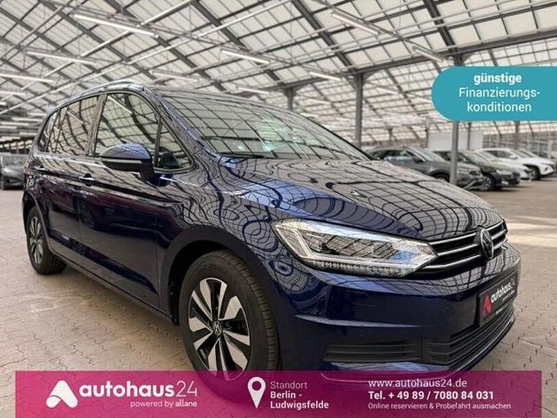 Blau Gebraucht 2024 VW Touran Move Van / Kleinbus | 32.490 € (Guter Preis) - Bild 1/4
