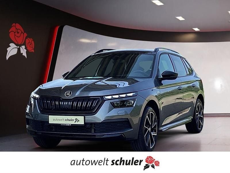 Graphitegrau metallic Gebraucht 2022 Skoda Kamiq Monte Carlo SUV | 25.949 € (Etwas zu teuer) - Bild 1/4