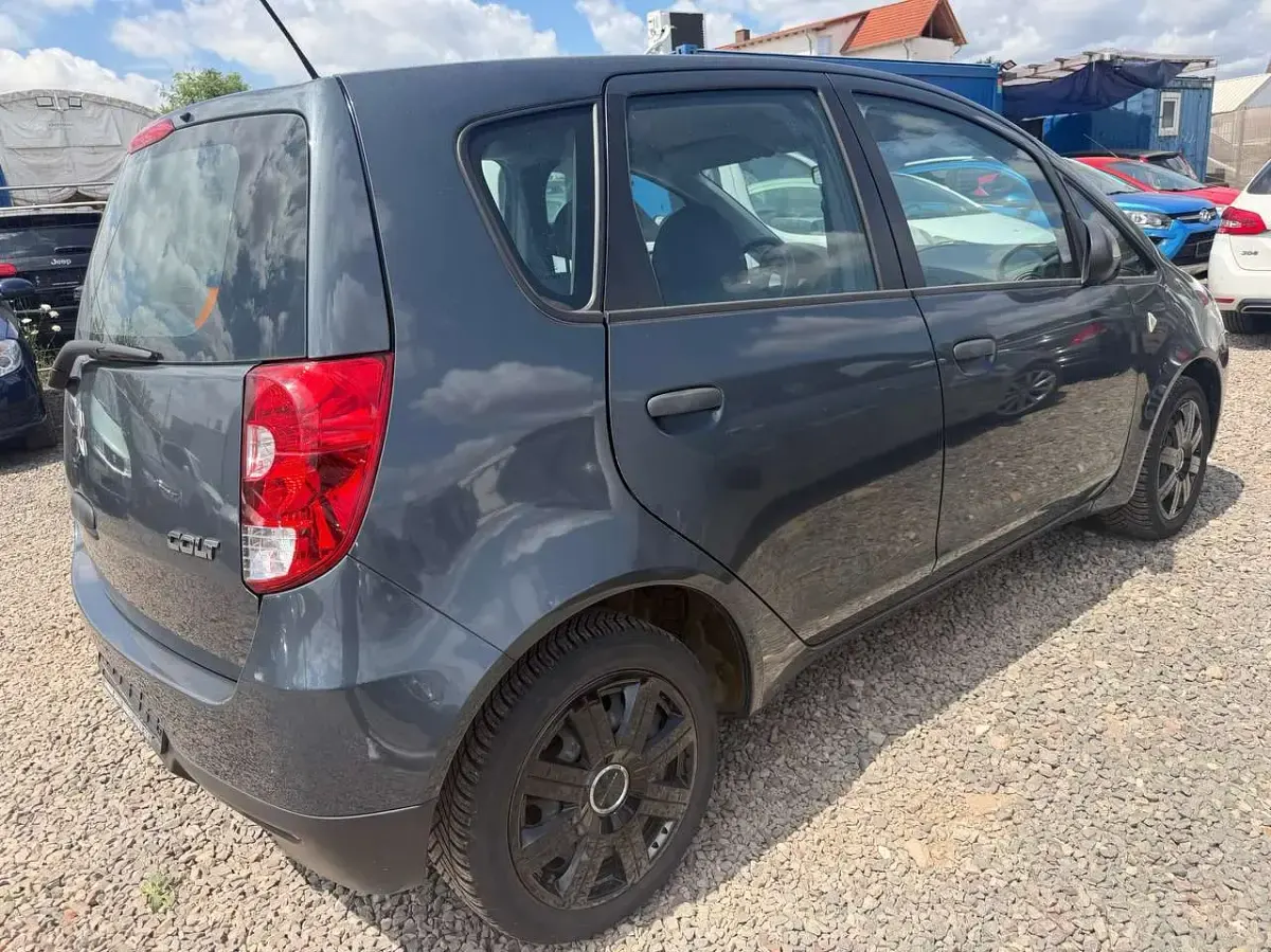 Gebraucht Mitsubishi Colt Inform 75 PS (55 kW) 2010 Quarzgrau (m) Kleinwagen