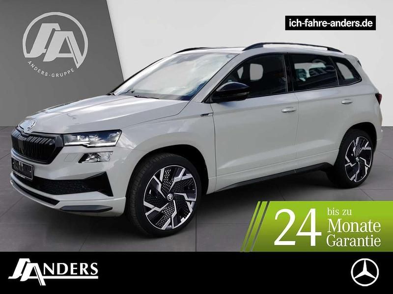 Grau Gebraucht 2022 Skoda Karoq SportLine SUV | 27.884 € (Fairer Preis) - Bild 1/3