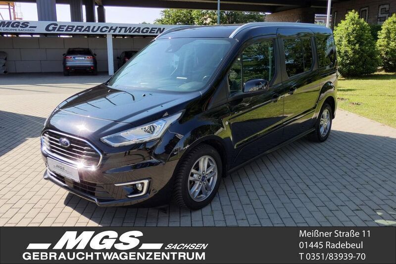 Obsidianschwarz metallic Gebraucht 2022 Ford Grand Tourneo Connect Titanium Van / Kleinbus | 28.950 € (Fairer Preis) - Bild 1/4