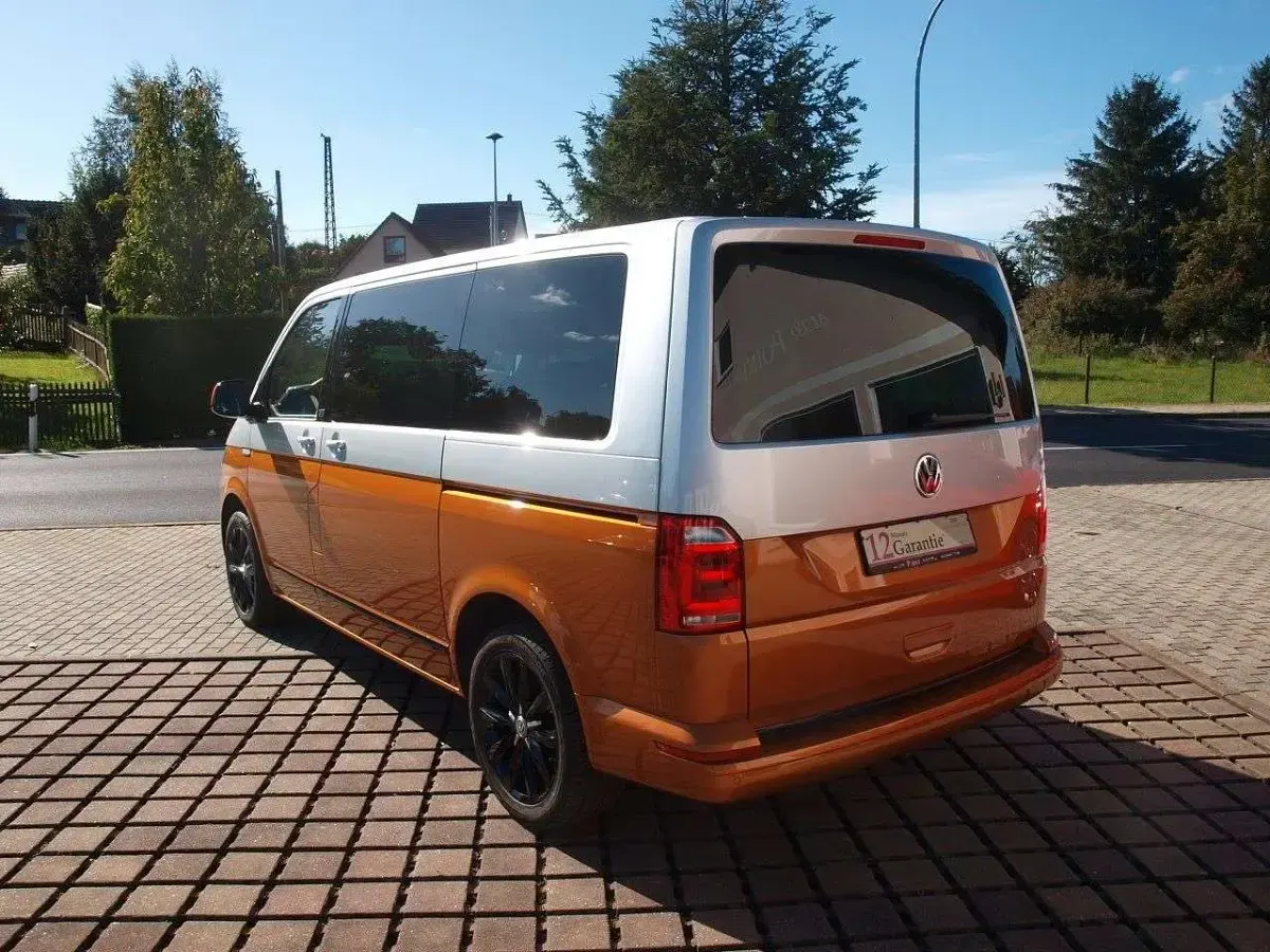 Gebraucht VW Multivan Generation Six 204 PS (150 kW) 2018 Reflexsilber / phönix orange Van / Kleinbus