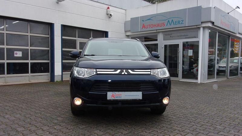 Blau Gebraucht 2012 Mitsubishi Outlander Invite SUV | 10.980 € (Teuer) - Bild 1/4