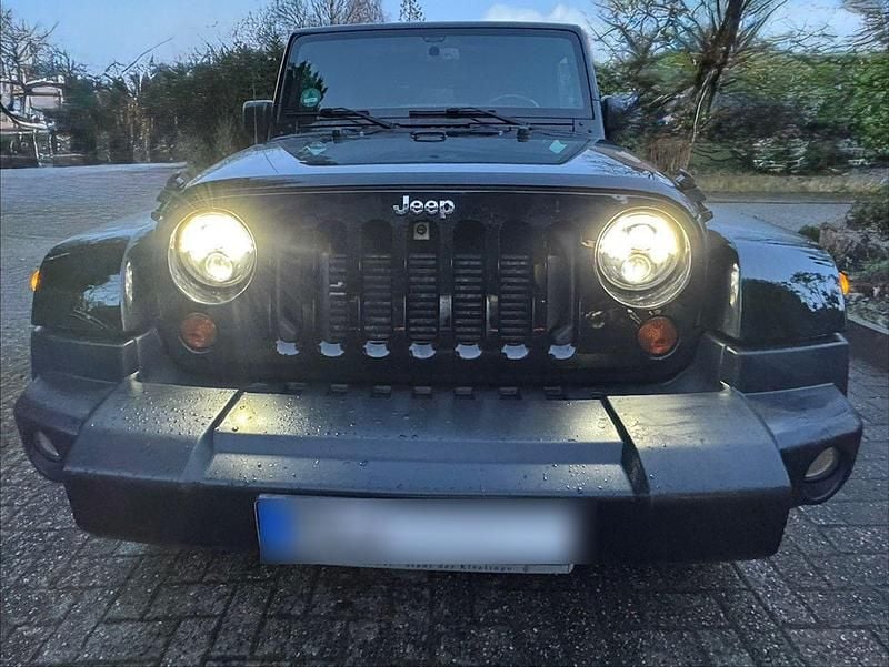 Schwarz Gebraucht 2013 Jeep Wrangler Sahara SUV | 23.500 € (Guter Preis) - Bild 1/4
