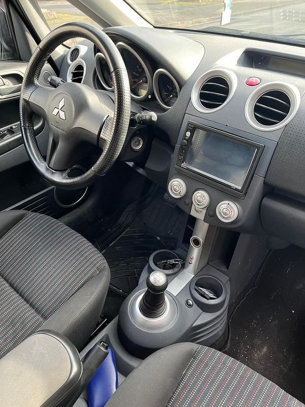 Gebraucht Mitsubishi Colt 95 PS (69 kW) 2008 Schwarz Kleinwagen