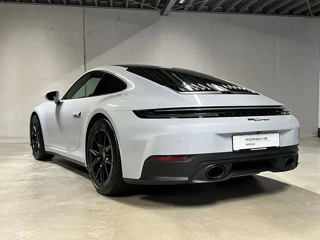 Gebraucht Porsche 911 Carrera 394 PS (289 kW) 2024 Eisgraumetallic Coupé