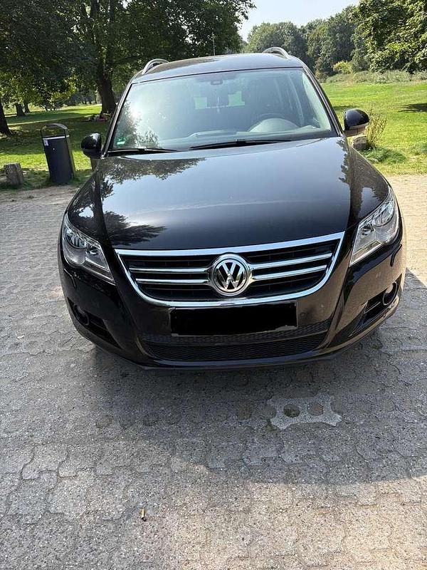 Schwarz Gebraucht 2010 VW Tiguan Team SUV | 5.900 € (Superpreis) - Bild 1/4