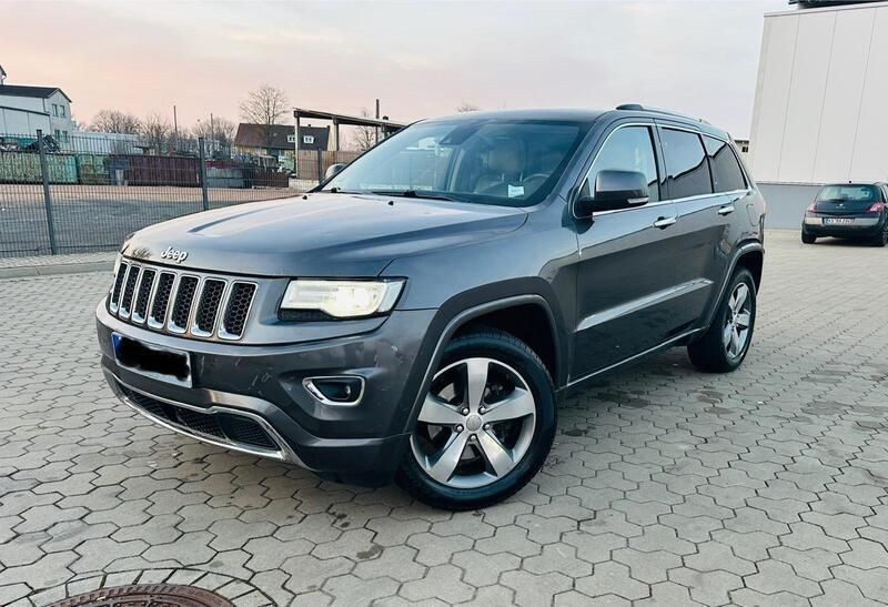 Grau Gebraucht 2013 Jeep Grand Cherokee Overland SUV | 8.400 € - Bild 1/4