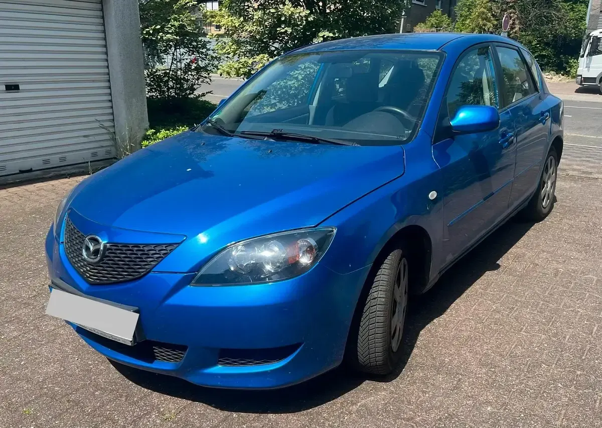 Używany Mazda 3 84 KM (61 kW) 2004 Niebieski Sedan/Limuzyna