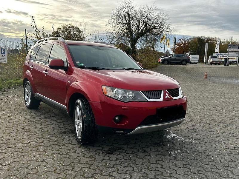 Rot Gebraucht 2009 Mitsubishi Outlander SUV | 3.299 € (Superpreis) - Bild 1/4