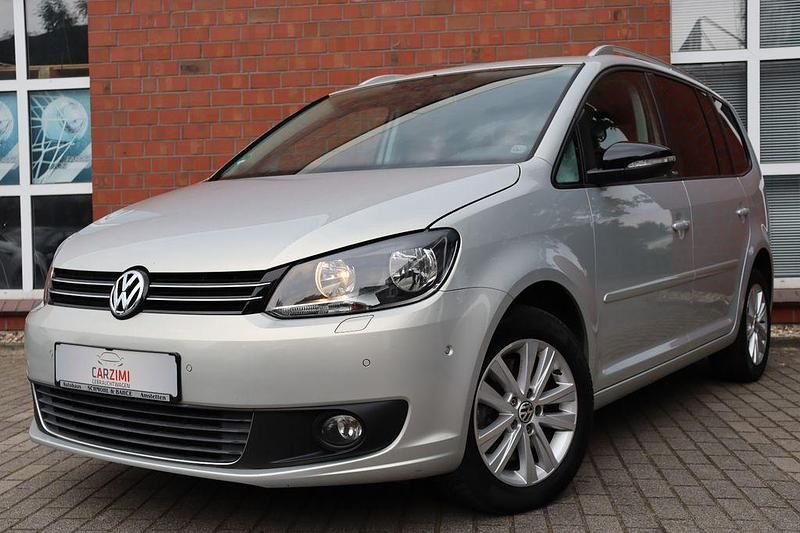 Grau Gebraucht 2011 VW Touran Style Van / Kleinbus | 7.990 € (Fairer Preis) - Bild 1/4