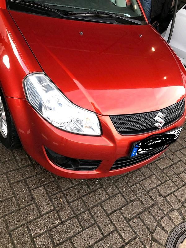 Second-hand Suzuki SX4 2008 Portocaliu Hatchback