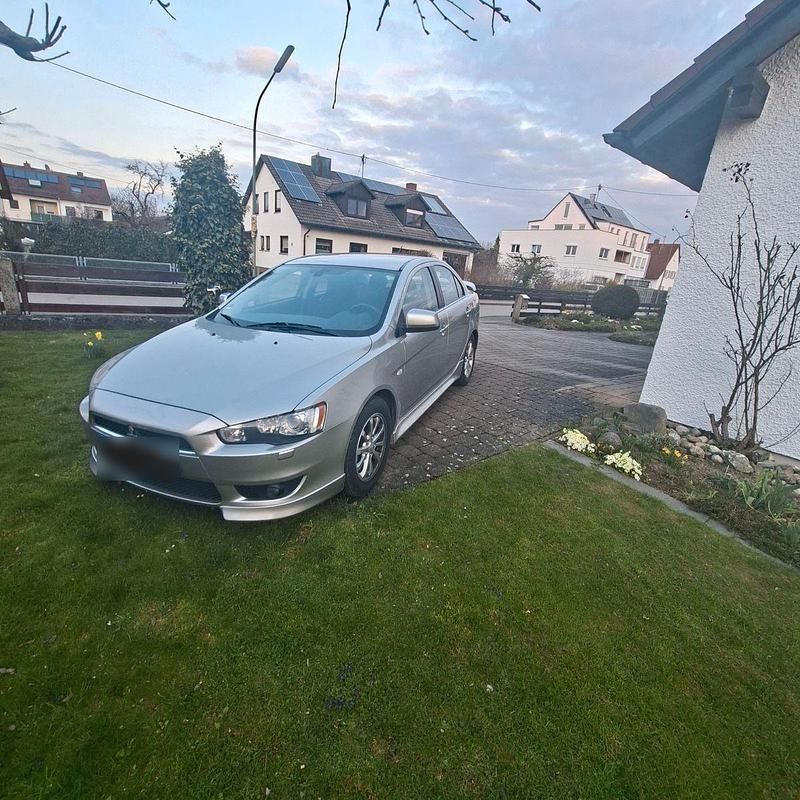 Gebraucht Mitsubishi Lancer 117 PS (86 kW) 2012 Silber Limousine