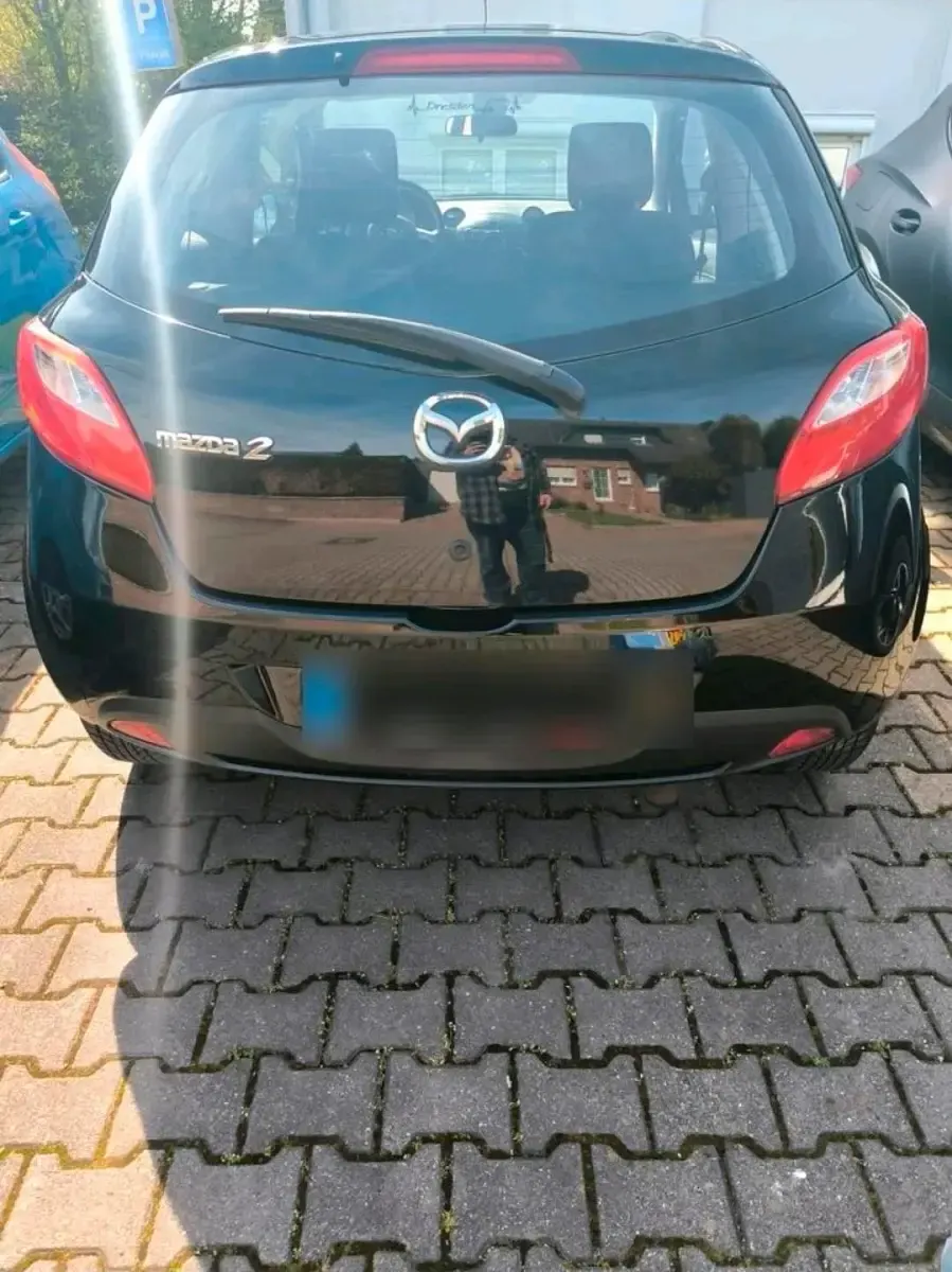 Gebraucht Mazda 2 68 PS (50 kW) 2010 Schwarz Kleinwagen