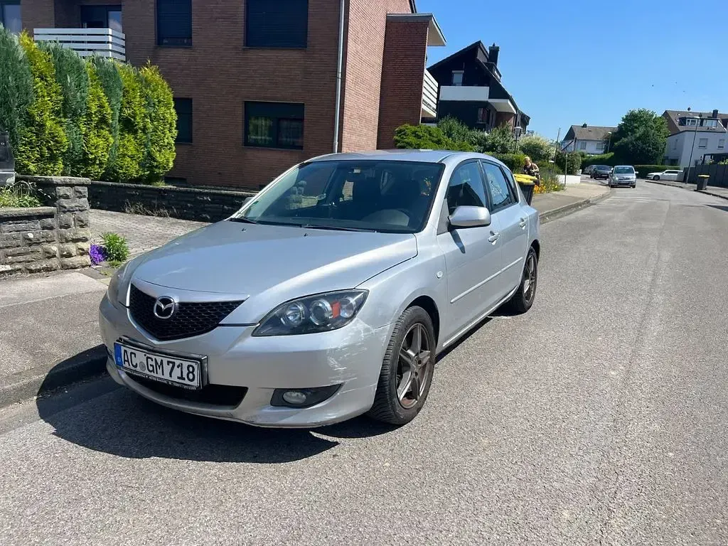 Używany Mazda 3 Active 105 KM (77 kW) 2005 Srebrny Sedan/Limuzyna