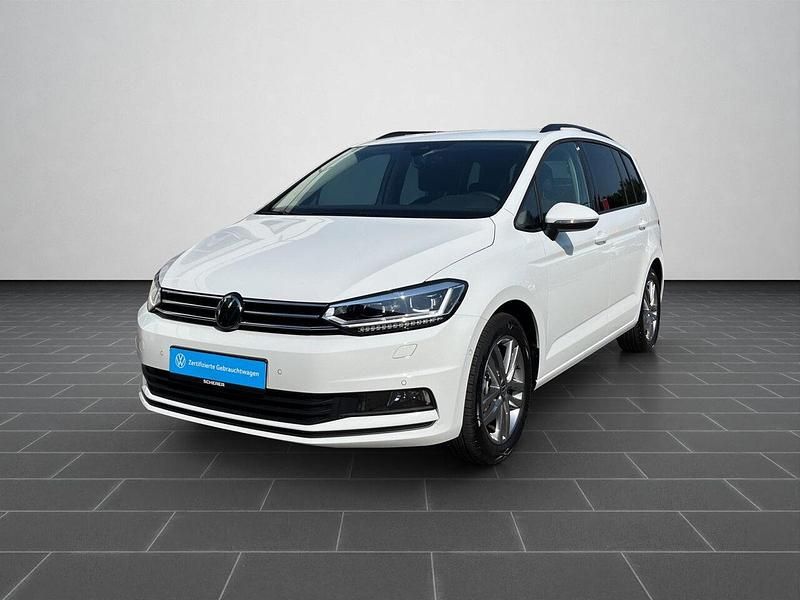Pure white (metallic) Gebraucht 2025 VW Touran Comfortline Van / Kleinbus | 34.900 € (Fairer Preis) - Bild 1/4