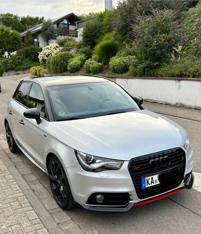 Silber Gebraucht 2013 Audi A1 Sportback Ambition Kleinwagen | 12.900 € (Fairer Preis) - Bild 1/4
