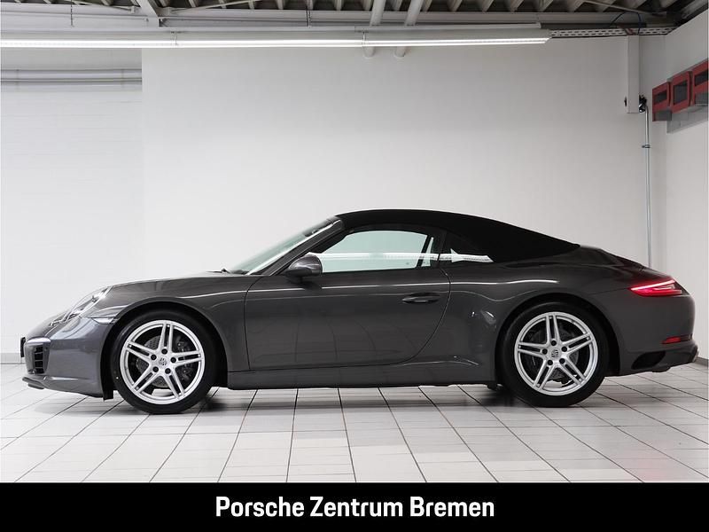 Gebraucht Porsche 911 Carrera 370 PS (272 kW) 2019 Achatgraumetallic Cabrio