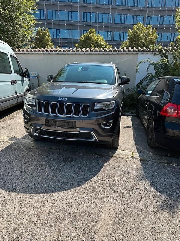 Grau Gebraucht 2016 Jeep Grand Cherokee Overland SUV | 20.900 € (Superpreis) - Bild 1/4