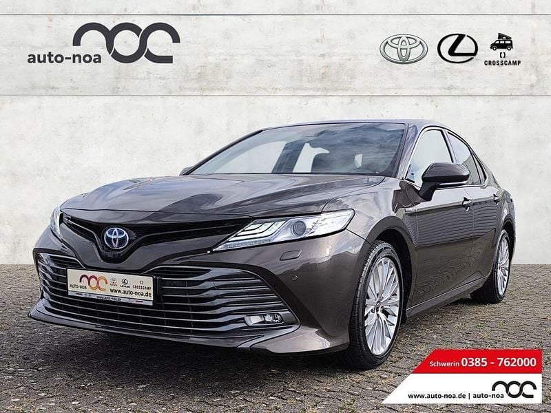 Braun Gebraucht 2019 Toyota Camry Hybrid Executive Limousine | 31.900 € - Bild 1/4