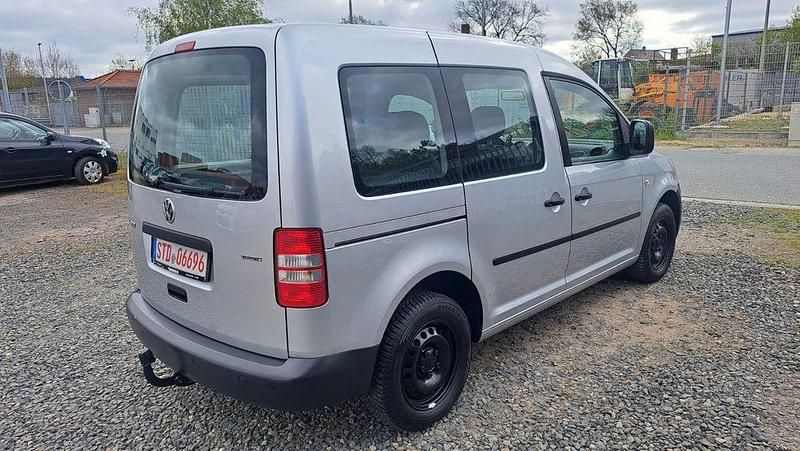 Second-hand VW Caddy 109 CP (80 kW) 2013 Argintiu Monovolum