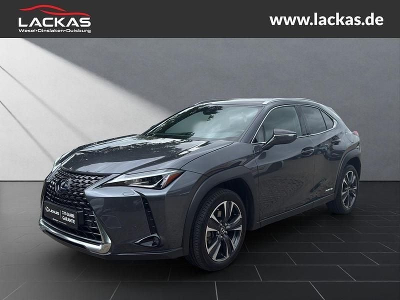 Grau Gebraucht 2022 Lexus UX 250h SUV | 28.450 € (Guter Preis) - Bild 1/4