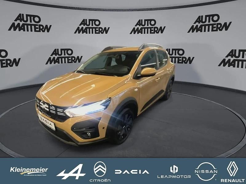 Beige Neu 2025 Dacia Sandero Expression Limousine | 19.459 € - Bild 1/4