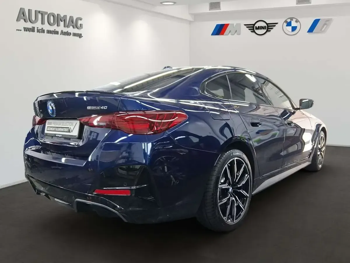Gebraucht BMW i4 Sport Line 250 kW (340 PS) 2025 Bmw individual tansanitblau Limousine