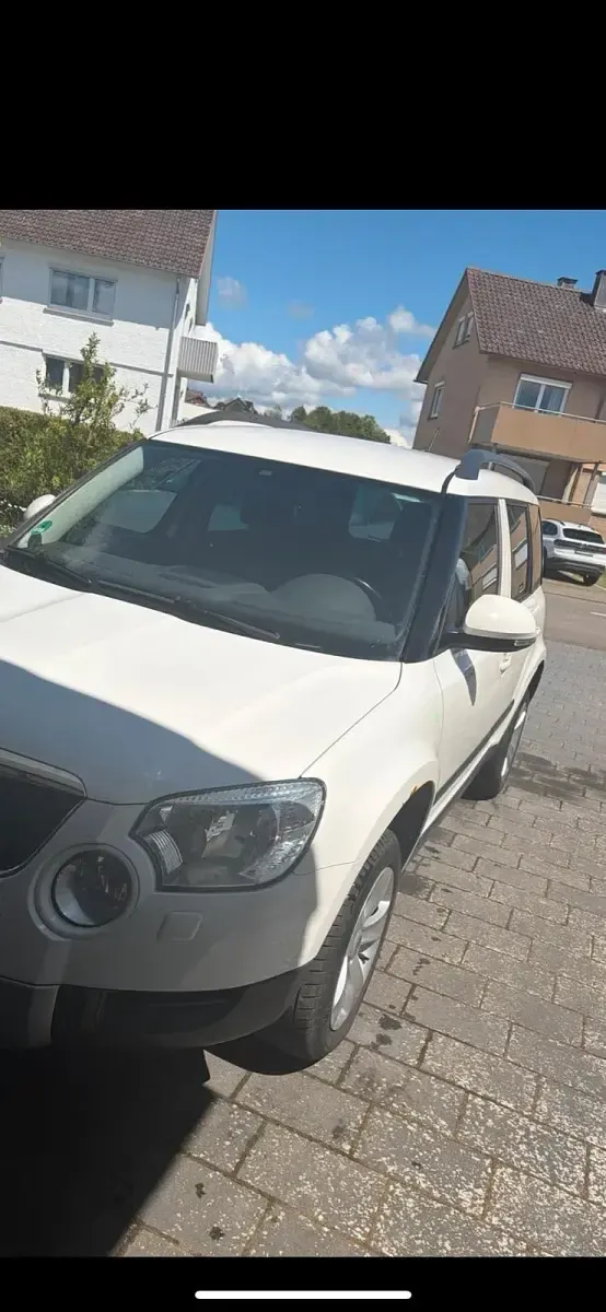 Używany Skoda Yeti 105 KM (77 kW) 2011 Biały SUV