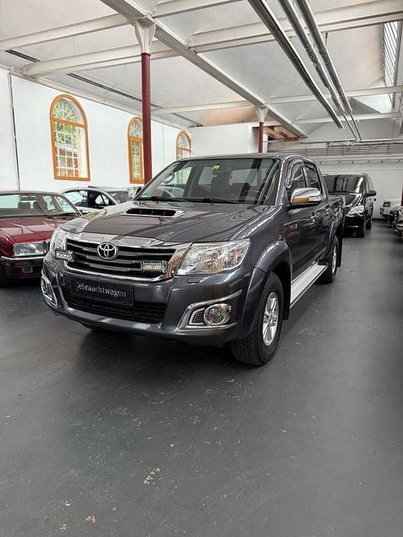 Grau Gebraucht 2013 Toyota HiLux Life Abholung | 15.900 € (Fairer Preis) - Bild 1/4