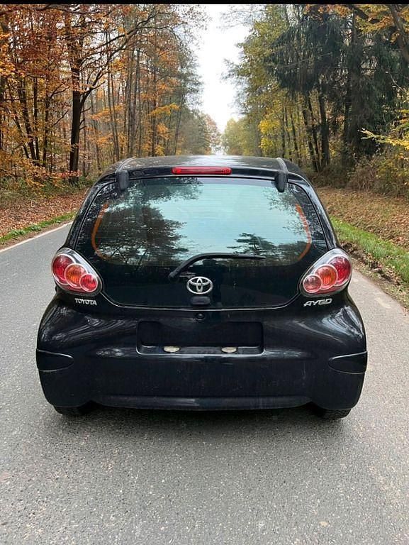 Gebraucht Toyota Aygo 68 PS (50 kW) 2010 Schwarz Kleinwagen