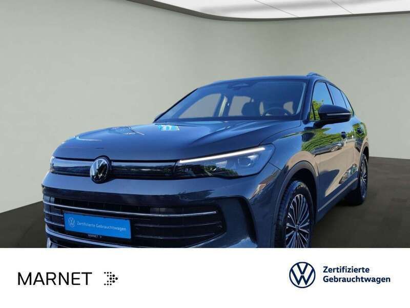 Delfingrau metallic Gebraucht 2024 VW Tiguan Life SUV | 33.690 € (Fairer Preis) - Bild 1/3