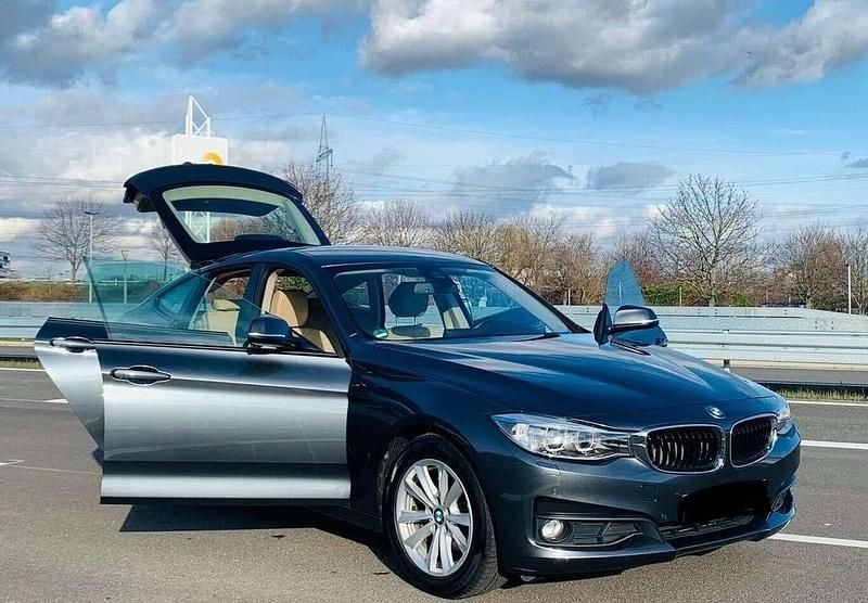 Grau Gebraucht 2014 BMW 320 Gran Turismo Sport Line Limousine | 16.400 € (Guter Preis) - Bild 1/4