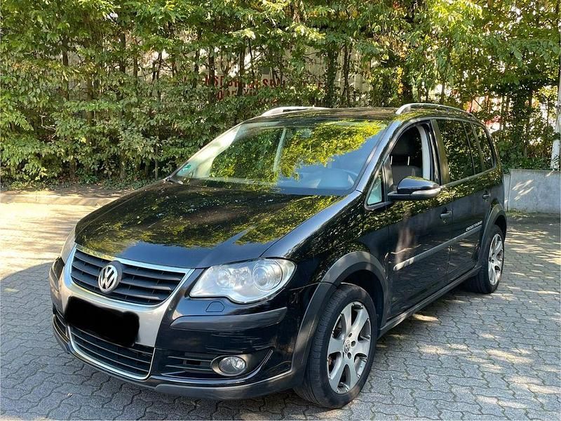 Schwarz Gebraucht 2009 VW Touran Cross Van / Kleinbus | 3.400 € (Fairer Preis) - Bild 1/4