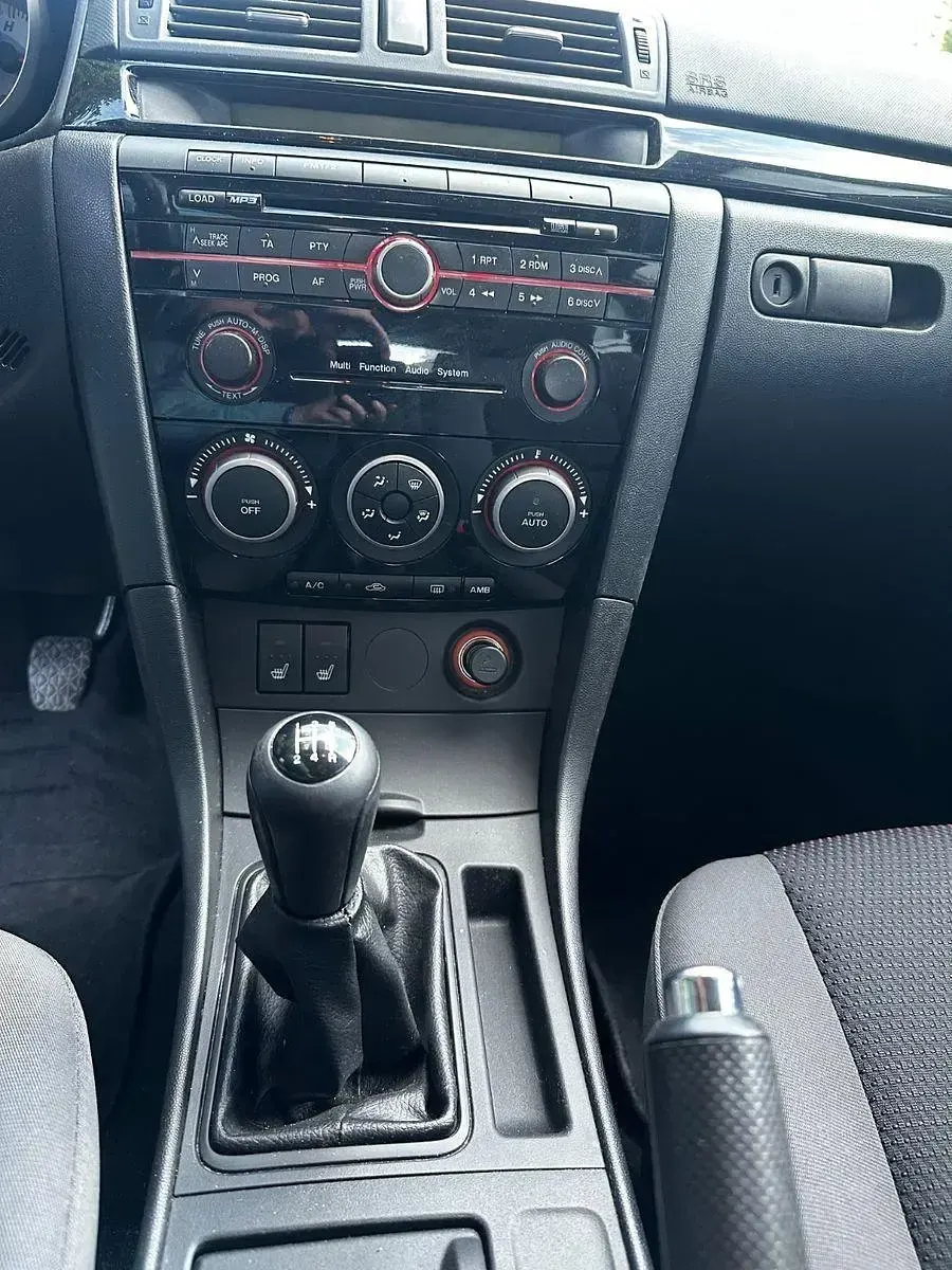 Używany Mazda 3 Inclusive 105 KM (77 kW) 2009 Szary Sedan/Limuzyna