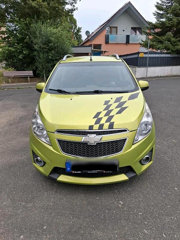 Grün Gebraucht 2011 Chevrolet Spark Kleinwagen | 2.100 € (Fairer Preis) - Bild 1/4