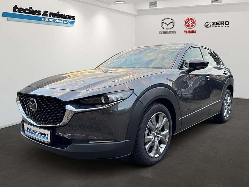 Machine gray Neu 2025 Mazda CX-30 Homura-Line SUV | 27.385 € - Bild 1/3