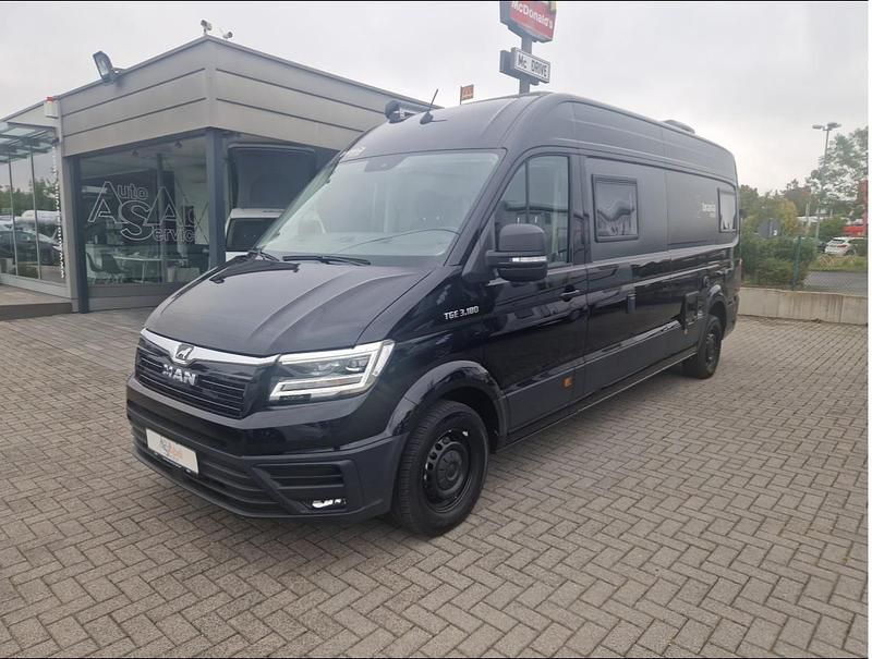Schwarz metallic Gebraucht 2024 MAN TGE Van | 85.399 € - Bild 1/4