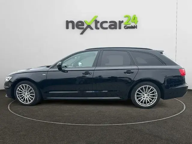 Używany Audi A6 313 KM (230 kW) 2014 Czarny Kombi