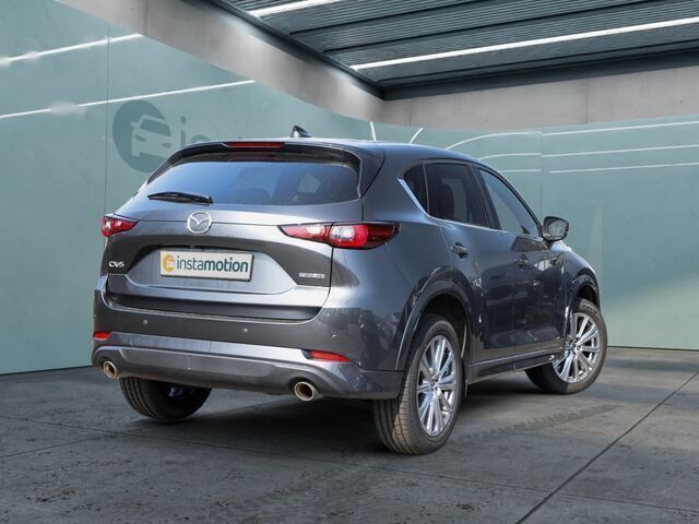 Grau Gebraucht 2023 Mazda CX-5 Takumi-Line SUV | 35.566 € (Fairer Preis) - Bild 1/2