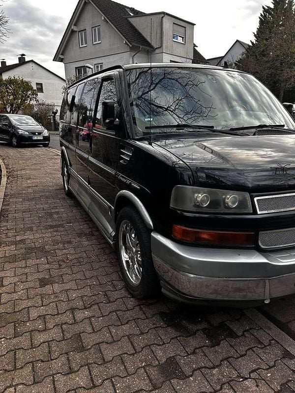 Schwarz Gebraucht 2010 Chevrolet Express Van / Kleinbus | 28.400 € - Bild 1/4