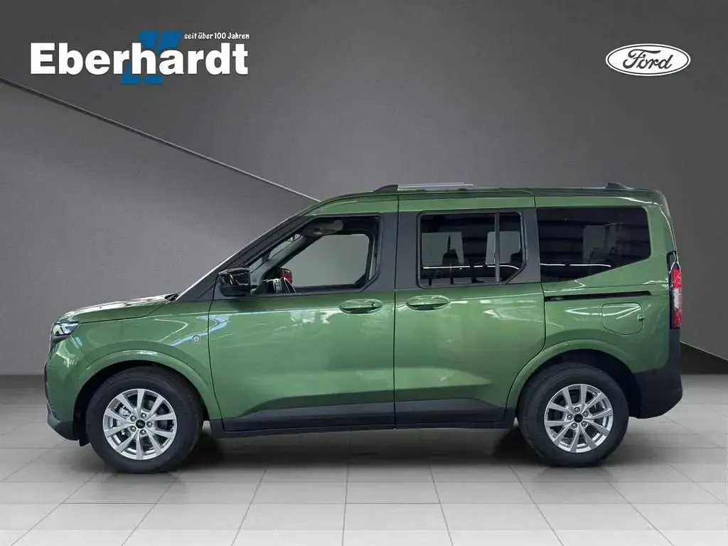 Gebraucht Ford Tourneo Courier Titanium 125 PS (91 kW) 2025 Bursting green Van / Kleinbus