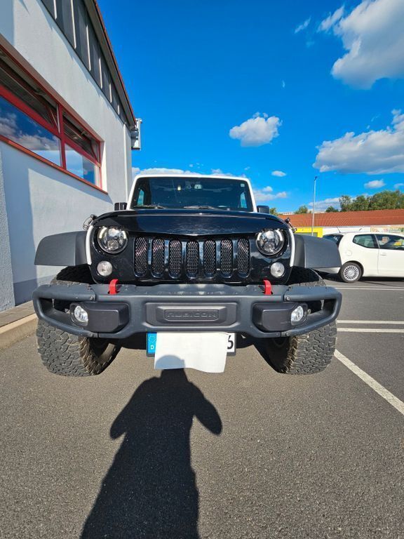 Weiß Gebraucht 2016 Jeep Wrangler Sahara SUV | 28.990 € (Superpreis) - Bild 1/4