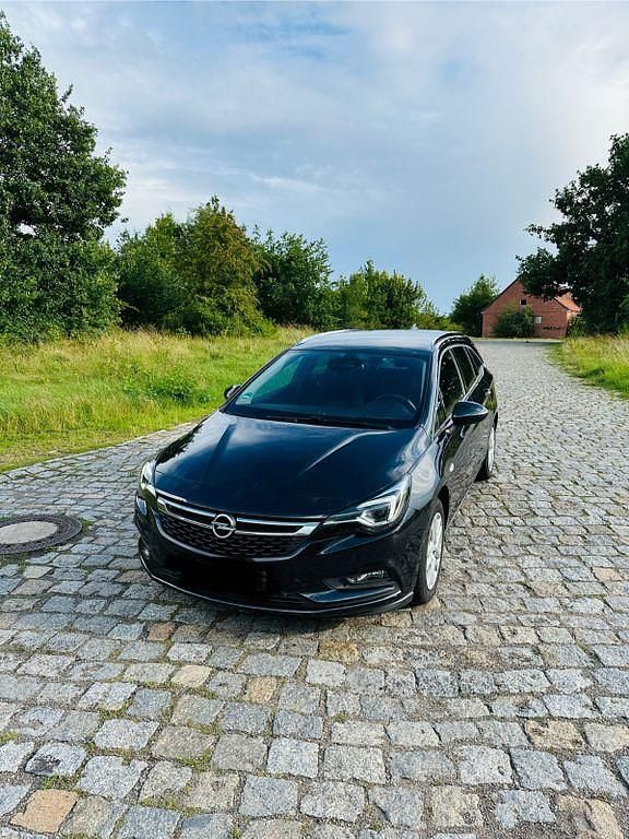 Schwarz Gebraucht 2016 Opel Astra Business Kombi | 9.999 € (Fairer Preis) - Bild 1/4
