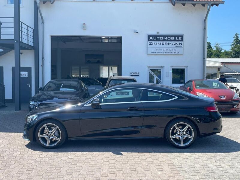 Obsidianschwarz (metallic) Gebraucht 2017 Mercedes C180 AMG line Coupé | 23.950 € (Etwas zu teuer) - Bild 1/4