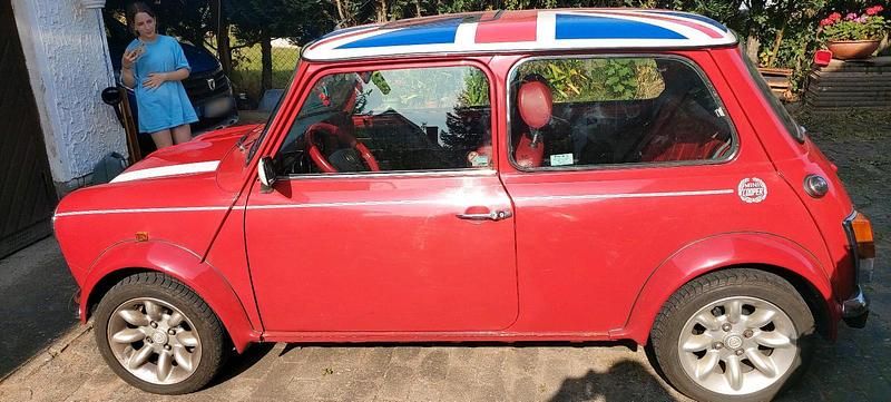Second-hand Rover Mini 63 CP (46 kW) 1998 Roșu Hatchback