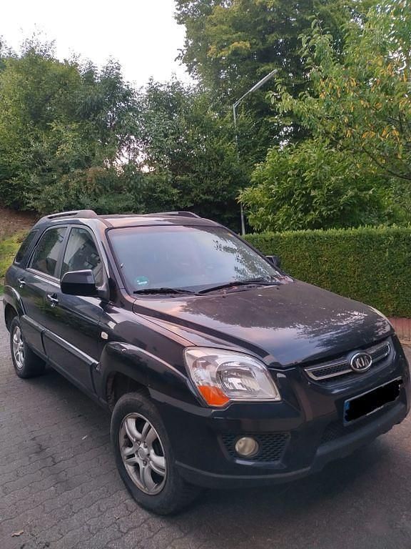 Schwarz Gebraucht 2009 Kia Sportage 2 SUV | 1.400 € - Bild 1/4
