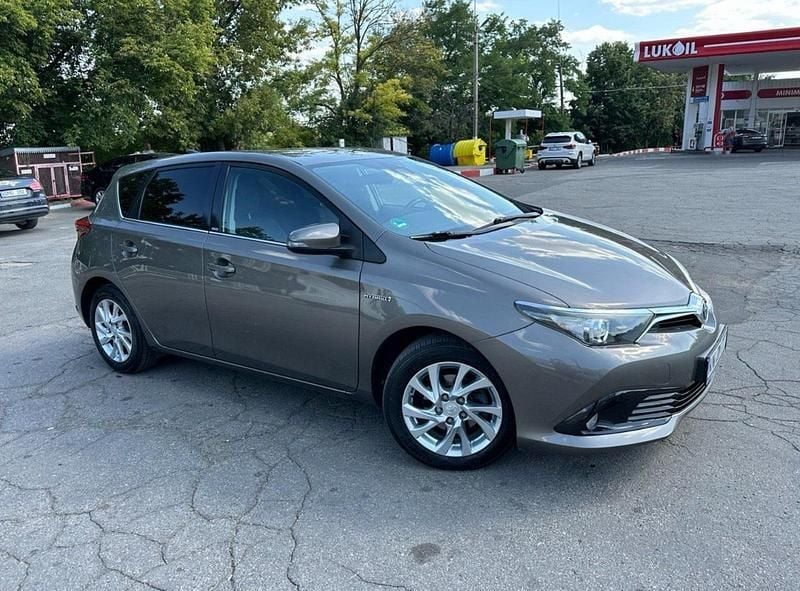Braun Gebraucht 2016 Toyota Auris Hybrid Executive Kleinwagen | 11.500 € (Guter Preis) - Bild 1/4