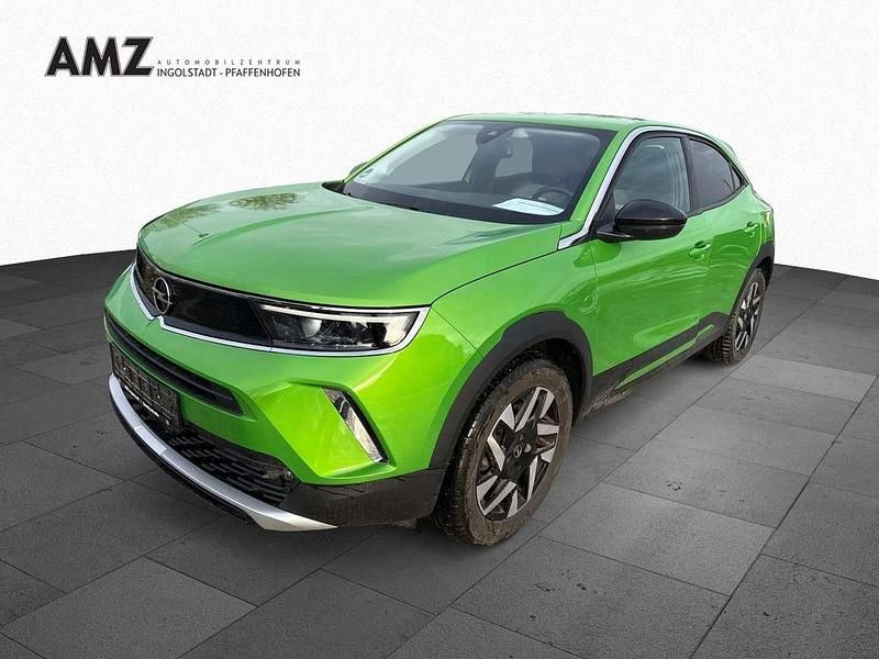 Gebraucht Opel Mokka-e Elegance 100 kW (136 PS) 2022 Matcha green/ikone gruen (metallic) SUV