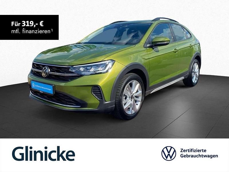 Visual green metallic Gebraucht 2024 VW Taigo Life SUV | 22.833 € (Fairer Preis) - Bild 1/2